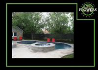 Pool and spa design and construction with flagstone pool deck.